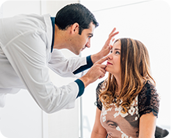 Doctor checking patient eye