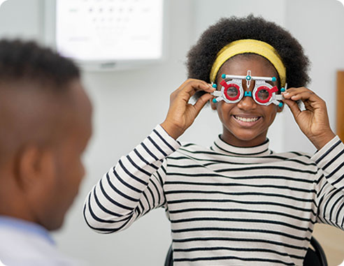 Child getting pediatric eye exam at Washington Eye Doctors