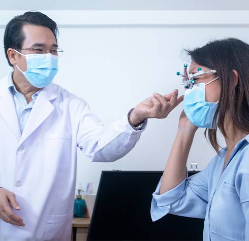 Girl getting eye check-up