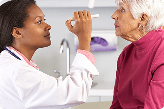 Doctor checking patient eyes for Red Eyes