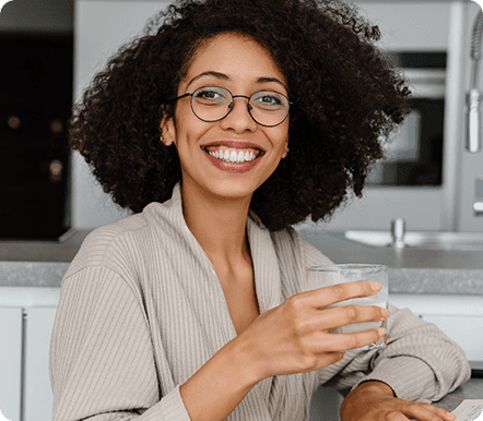 Woman smiling wearing glasses