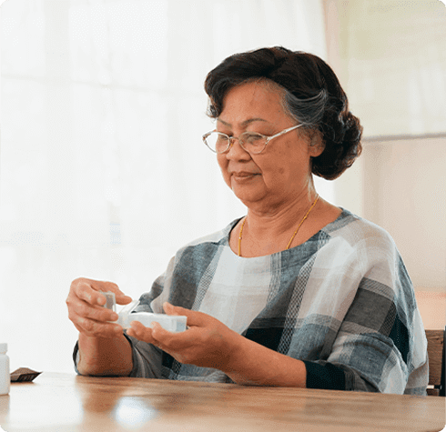 Woman holding medication