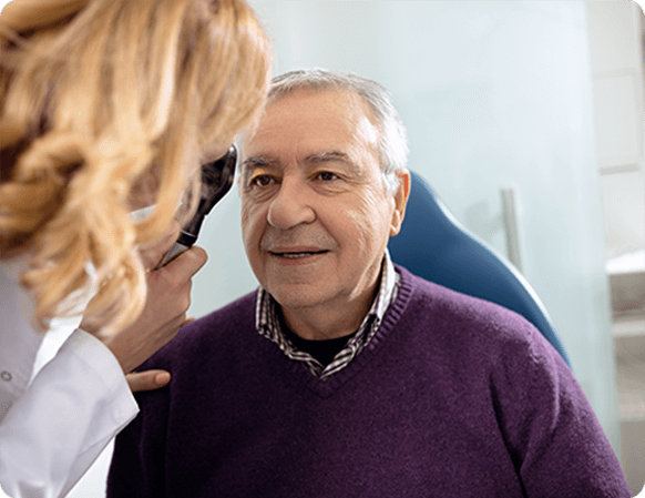 Doctor checking patient eyes for glaucoma