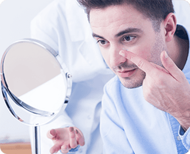 Man putting on scleral lenses from Washington Eye Doctors 