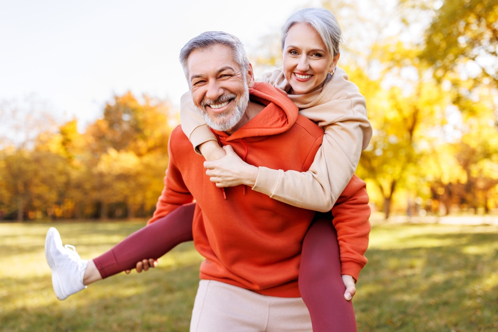 Portrait,Of,Lovely,Happy,Elderly,Couple,On,Morning,Run,Outside Girl getting a routine eye exam